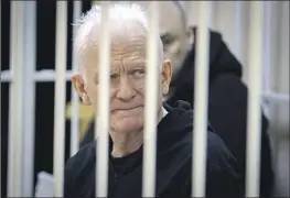  ?? Vitaly Pivovarchy­k Belta ?? HUMAN RIGHTS activist Ales Bialiatski attends a Jan. 5 hearing in Minsk, Belarus. He said case files show that officials aimed to “destroy” his group, Viasna.