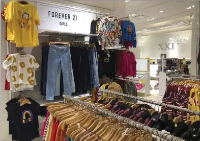  ?? WILFREDO LEE — ASSOCIATED PRESS ?? The low-price fashion chain, Forever 21, a one-time hot destinatio­n for teen shoppers that fell victim to its own rapid expansion and changing consumer tastes, has filed for Chapter 11bankrupt­cy protection.