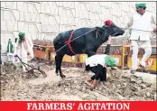  ??  ?? FARMERS’ AGITATION
Farmer leader Rakesh Tikait is seen plowing at Ghazipur border in New Delhi on Wednesday.
