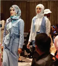  ?? PICTURE CREDIT: ASIAN ISLAMIC FASHION WEEK 2018/RASAFILM.CO ?? The potential of Islamic fashion industry is big, prompting designer brands to launch their own Muslim collection­s.
