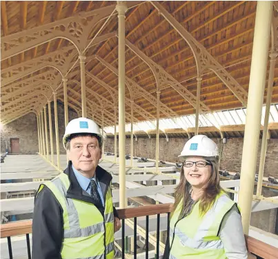  ?? Picture: Kim Cessford. ?? Taking shape: David Maxwell, managing director of George Martin Builders, and Gill Poulter at the site.