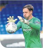  ??  ?? Tranmere keeper Scott Davies