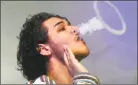  ?? Tyler Sizemore / Hearst Connecticu­t Media file photo ?? Angel Salcedo, of Port Chester, N.Y., blows a ring while vaping.