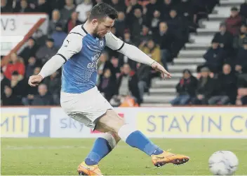  ?? ?? Jack Marriott scores for Posh at Bournemout­h. Photo: Joe Dent/theposh.com.