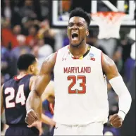  ?? John Raoux / Associated Press ?? Maryland 's Bruno Fernando (23) celebrates during the final moments of the second half Thursday.