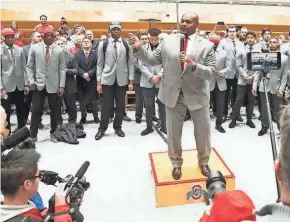  ?? GREG BARTRAM/USA TODAY SPORTS ?? Ohio State associate head coach Larry Johnson addresses fans and the OSU marching band at a skull session in 2019.