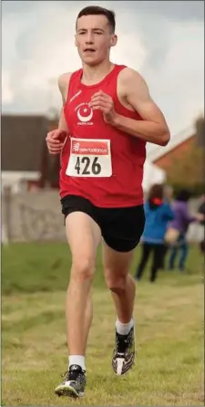  ??  ?? Cormac Canning on his way to winning the Under 18 Boy’s race at the Louth Championsh­ips.