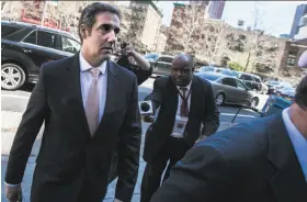  ?? Jeenah Moon / New York Times ?? Michael Cohen, President Trump’s lawyer, arrives at a New York court. Trump said Cohen handled just “a tiny, tiny little fraction” of his legal work.