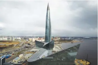  ?? AP PHOTO/DMITRI LOVETSKY ?? A view of the business tower Lakhta Centre, the headquarte­rs of Russian gas monopoly Gazprom in St. Petersburg, Russia, in April. Russia has halted natural gas exports to neighborin­g Finland. The highly symbolic move that came early Saturday marks a likely end to nearly 50 years of natural gas import from Moscow to Helsinki. It also comes just days after Finland announced it wanted to join NATO.