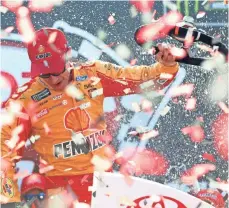  ?? PETER CASEY, USA TODAY SPORTS ?? Joey Logano celebrates Sunday in Richmond, Va., after earning his 18th overall victory in NASCAR’s top series.