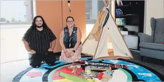  ?? ALLAN BENNER THE ST. CATHARINES STANDARD ?? Seapieces Marsland, an Indigenous clinician from Pathstone Mental Health, right, and board member Josh Crawley sit in the new Indigenous Healing Room at the Branscombe centre, Wednesday.