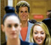 ?? MARK MAKELA / THE NEW YORK TIMES ?? Andrea Constand (center) leaves the courtroom after Bill Cosby was sentenced on Tuesday. She had no comment.