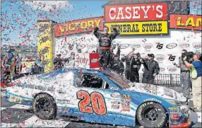  ?? [CHARLIE NEIBERGALL/ THE ASSOCIATED PRESS] ?? Ryan Preece celebrates in victory lane after winning Saturday’s Xfinity race.