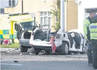  ??  ?? > The scene of the fatal crash on Western Avenue, Cardiff