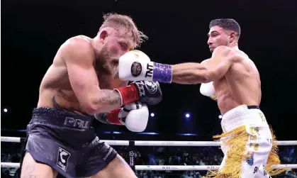  ?? ?? Tommy Fury lands a left on Jake Paul during their fight in Saudi Arabia. Photograph: François Nel/Getty Images