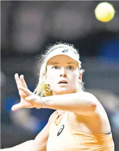  ?? — AFP photo ?? CoCo Vandeweghe from the US returns the ball to Romania’s Simona Halep during their quarter-final match at the WTA Porsche Tennis Grand Prix in Stuttgart, southweste­rn Germany, on April 27, 2018.