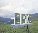  ??  ?? > Huge mirrored letters spell EPIC
