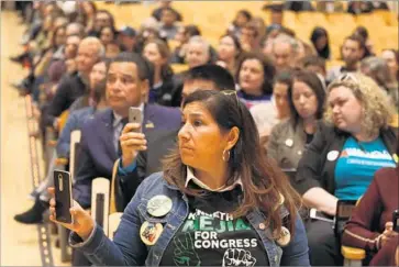  ?? Glenn Koenig Los Angeles Times ?? CANDIDATE supporters and potential voters attend a forum in Eagle Rock on Wednesday for those seeking the 34th Congressio­nal District seat vacated by Xavier Becerra. The 24 candidates include 20 Democrats.