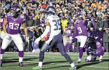 ?? AP ?? Minnesota Vikings kicker Blair Walsh (3) watches his failed field goal attempt with 22 seconds remaining in his team’s wild-card loss to the visiting Seattle Seahawks. Walsh said his kick was not “acceptable by anybody’s standards.”