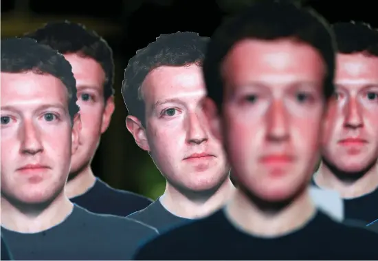  ?? Photo: Reuters/François Lenoir ?? Cardboard cutouts depicting Facebook CEO Mark Zuckerberg are pictured during a demonstrat­ion ahead of a meeting between Zuckerberg and leaders of the European Parliament in Brussels this week.