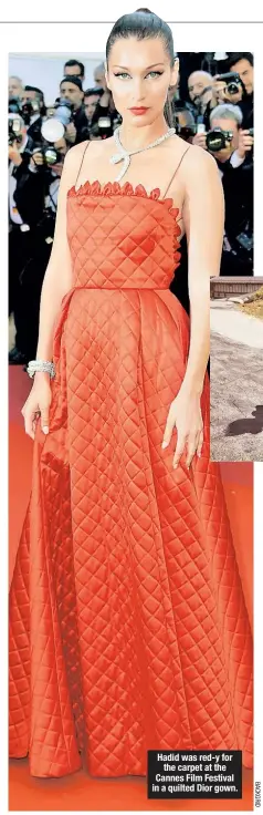  ??  ?? Hadid was red-y for the carpet at the Cannes Film Festival in a quilted Dior gown.