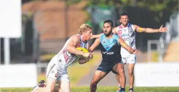  ?? Picture: KERI MEGELUS ?? Eddie Barlow of Southern Districts about to be tackled by Darwin’s Jarrod Stokes