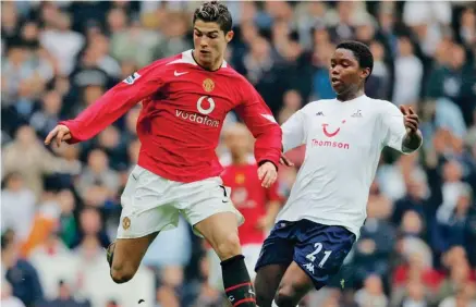  ??  ?? (Right) Coming up against Cristiano Ronaldo in England.