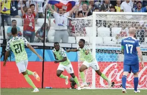  ?? AFP ?? Nigerian players celebrate a goal during the match against Iceland. —