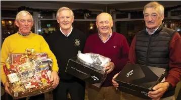  ??  ?? John Flynn (Christmas hamper competitio­n winner in New Ross), Seán Furlong (Captain), Mark Murphy and Richie Alyward (winter league winners).