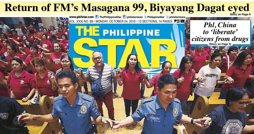  ?? MIGUEL DE GUZMAN ?? SECOND CHANCE: Police officers, drug dependents and Catholic faithful hold hands during a mass at the Manila Cathedral yesterday for the launch of Sanlakbay, a drug rehabilita­tion program of the Archdioces­e of Manila. Story on Page 5.