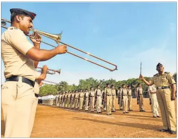  ??  ?? Personnel of the home guards, police force and traffic police practise for the parade on May 1 at NMSA grounds at Vashi in Navi Mumbai on Thursday.