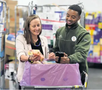  ??  ?? Helping out
Tesco have been donating food across the country during the crisis