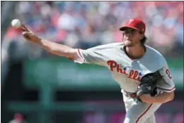  ?? NICK WASS — THE ASSOCIATED PRESS ?? Phillies starting pitcher Aaron Nola delivers during the first inning Saturday against the Washington Nationals.
