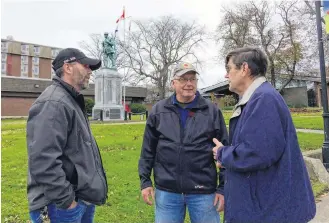  ??  ?? Todd Muise, left, Andre Boudreau and George Egan during a visit to the Yarmouth cenotaph in 2018. Muise is a member of the Wedgeport legion (branch 155) and Boudreau is the branch’s secretary. The Wedgeport legion is scheduled to hold an event on Feb. 28 to mark the 75th anniversar­y of the withdrawal of Canadian forces from Italy. Egan, representi­ng the Wartime Heritage Associatio­n, will be the main speaker at the Wedgeport event. ERIC BOURQUE