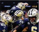  ?? GETTY IMAGES ?? Saints kicker Wil Lutz (top) started the season with a winning 58-yard field goal as time expired against the Texans. He signed a five-year, $20.25 million extension in March.