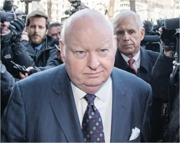  ?? JUSTIN TANG / THE CANADIAN PRESS ?? Senator Mike Duffy is followed by his lawyer Donald Bayne, right, as he arrives at the courthouse in Ottawa for his first court appearance on April 7, 2015.