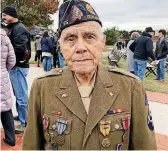  ?? [PHOTO BY ROBERT MEDLEY, THE OKLAHOMAN] ?? World War II Army veteran Mordell Trammell, 93, of Shawnee, attends the Veterans Day ceremony Sunday at the 45th Infantry Division Museum in northeast Oklahoma City.