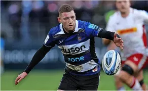  ?? ?? Finn Russell received a ribbing from teammate Elliott Stooke after they had both been replaced