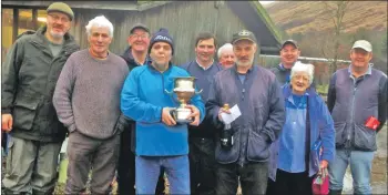  ??  ?? Winner Gordon Griffiths, centre, with the rest of Cairndow Clay Target Club.