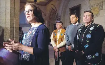  ?? ADRIAN WYLD, THE CANADIAN PRESS ?? Métis National Council president Clement Chartier, second from left, president of the Inuit Tapiriit Kanatami Natan Obed and Assembly of First Nations Chief Perry Bellegarde, right, listen to Indigenous Services Minister Jane Philpott respond to a question in Ottawa on Friday.