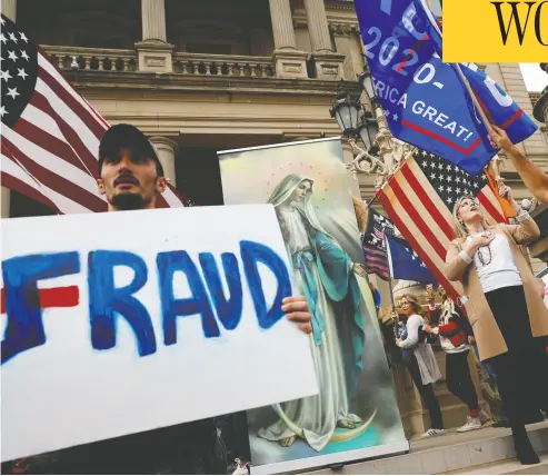  ?? SHANON STAPLETON / REUTERS ?? Protesters rally in Lansing, Mich., on Sunday after Joe Biden was declared the winner of the U. S. election, defeating
Donald Trump. On Sunday Trump golfed, tweeted about the “lamestream media” and refused to concede power.