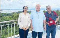  ?? ?? Puerto Princesa City Mayor Lucilo Bayron is flanked by city agricultur­ist Melissa Macasaet and city sports director Rocky Austria.