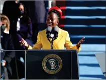  ?? ROB CARR — GETTY IMAGES/ TNS ?? Youth Poet Laureate Amanda Gorman speaks during the inaugurati­on of U.S. President-elect Joe Biden on the West Front of the U.S. Capitol on January 20, 2021 in Washington, DC.