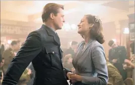  ?? Daniel Smith Paramount Pictures ?? BRAD PITT and Marion Cotillard star in the World War II drama “Allied.”