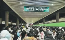  ?? PROVIDED TO CHINA DAILY ?? Passengers crowd a railway station in Urumqi, Xinjiang Uygur autonomous region, on Saturday. Many trains and flights in the region were delayed or canceled over the weekend due to heavy snow.