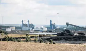  ?? KEVIN SPEAR/STAFF FILE PHOTO ?? NextEra pursues ownership stake of this power plant at the Orlando Utilities Commission Stanton Energy Center in east Orange County.