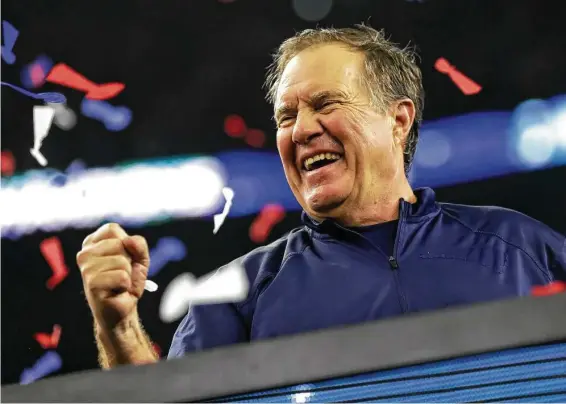  ?? Ronald Martinez / Getty Images ?? All that glitters is gold for coach Bill Belichick and his Patriots, especially at NRG Stadium where they have posted two of their Super Bowl victories.