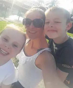  ??  ?? ■ Loving mum Kara Hogland with her children Abbi, six, and 11-year-old Luke