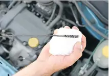  ??  ?? Doing your own oil change can be an easy task if you prepare and take the proper precaution­s.