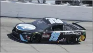  ?? TERRY RENNA — THE ASSOCIATED PRESS ?? Martin Truex Jr. drives into Turn 1on May 9at Darlington Raceway in Darlington, S.C.